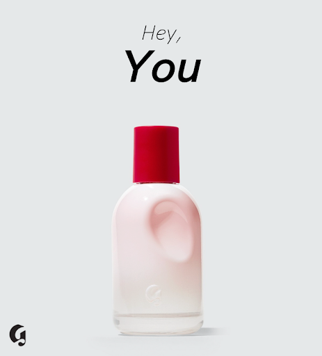 Glossier You fragrance bottle with 'Hey, You' typography